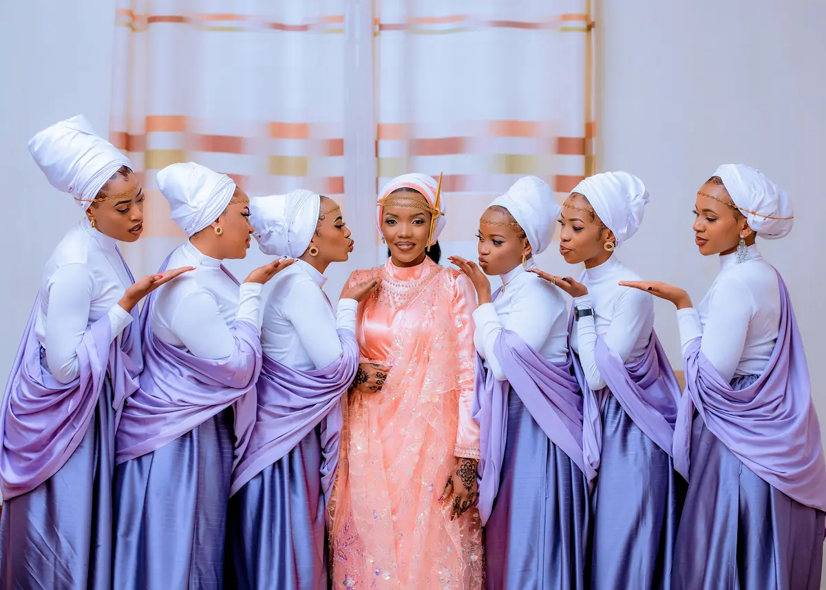 Traditional Rwandan bridesmaids in cultural attire - Gusaba ceremony photography Kigali