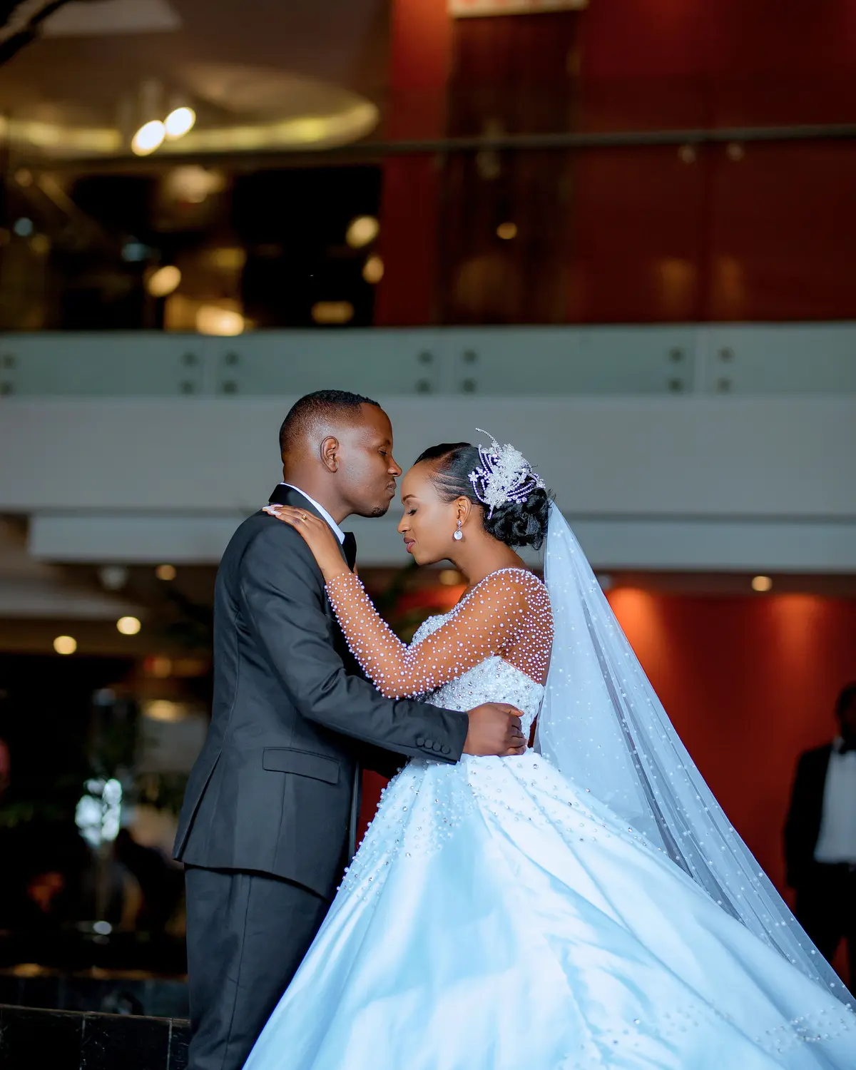Romantic couple kiss at wedding venue - professional wedding photography Kigali Rwanda